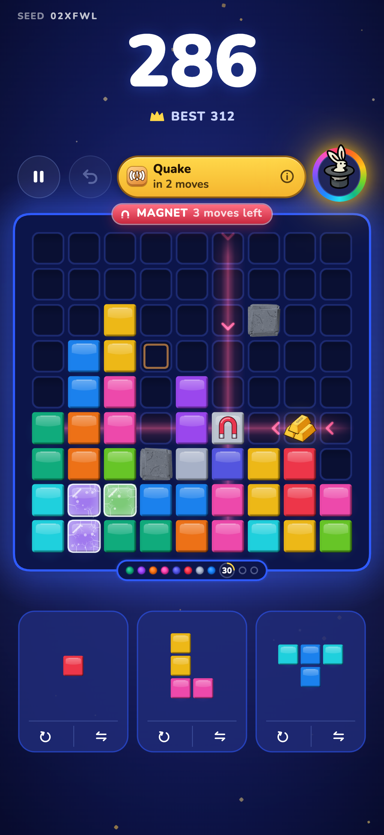 A Magnet event active on the board with 3 moves left, pulling blocks toward it, and a Quake event due in 2 moves.